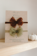 A set of two bow tiebacks, brown, green, tulle, RTS