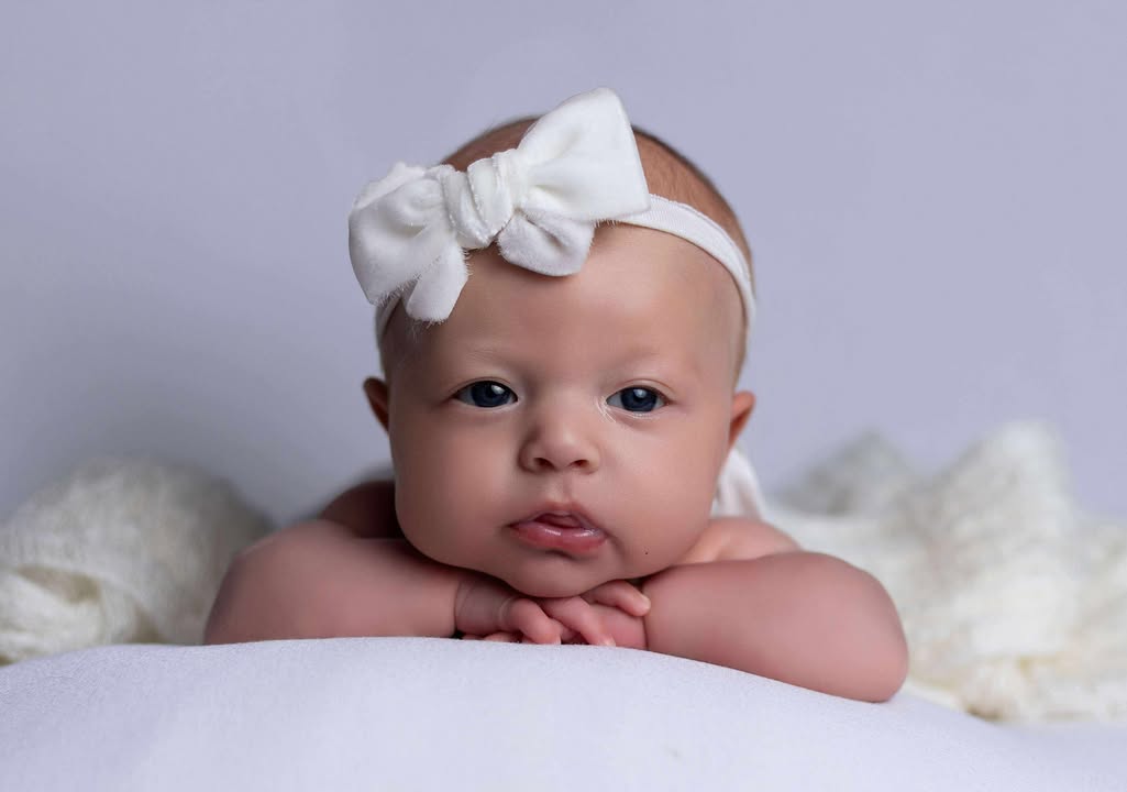 Soft off-white and beautifully bold — this larger bow tieback adds a touch of classic charm to every moment.
