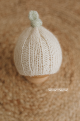 Knitted baby hat in halloween theme, off white newborn with green tip