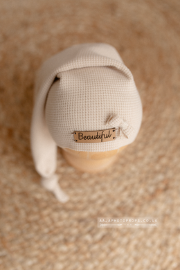 newborn hat with a knot and engraved leather patch beautiful